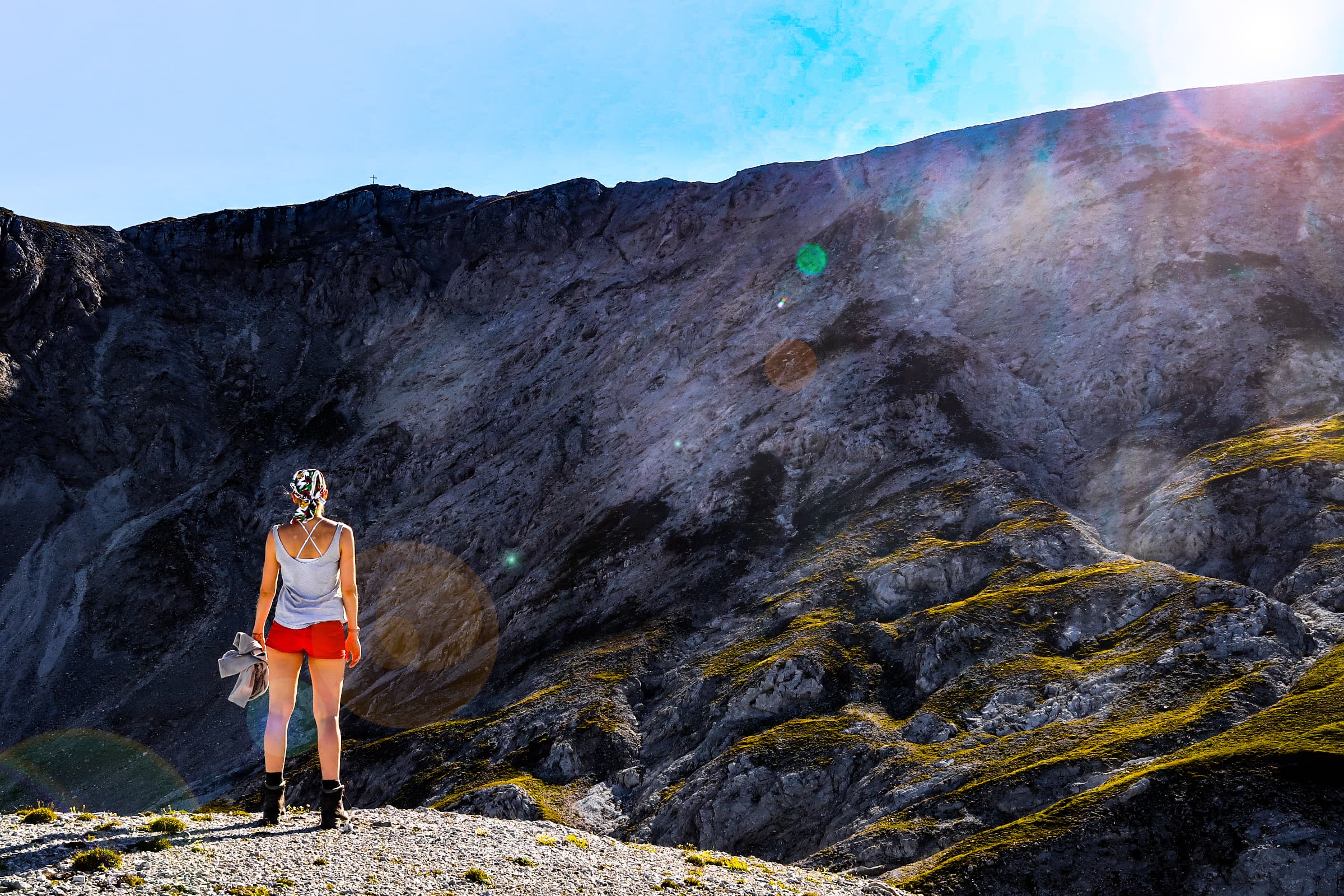 Hiker in front of mountain scenery in Schladming-Dachstein
